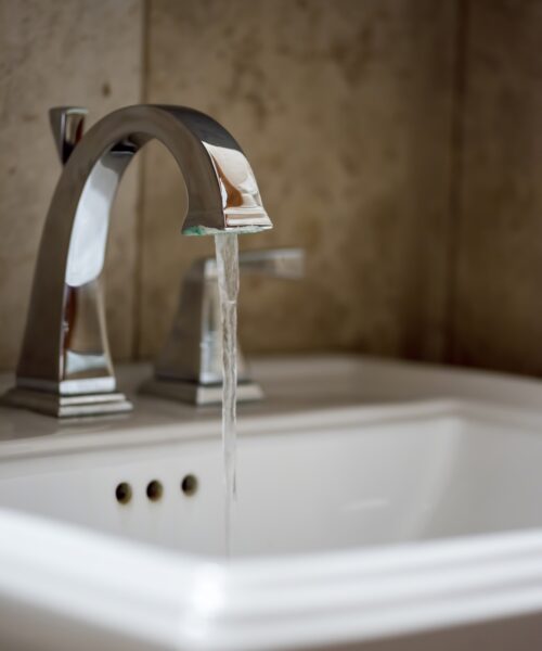 Closeup of a modern Bathroom faucet and sink